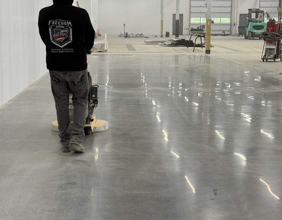 Professional concrete polishing equipment in action